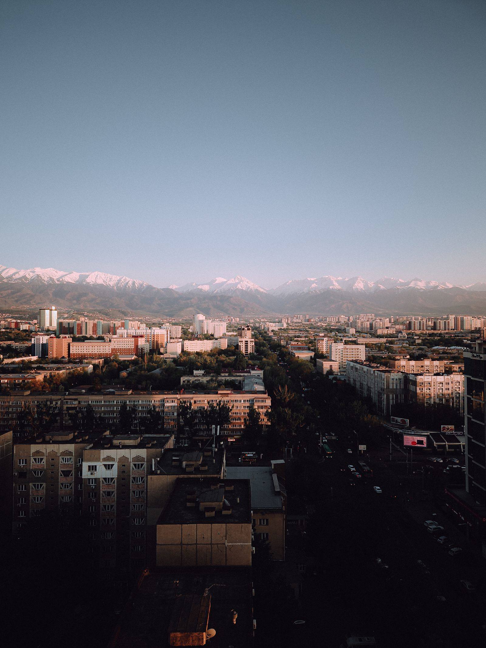 Aerial view of Almaty, Kazakhstan with the Tien Shan mountains in the distance